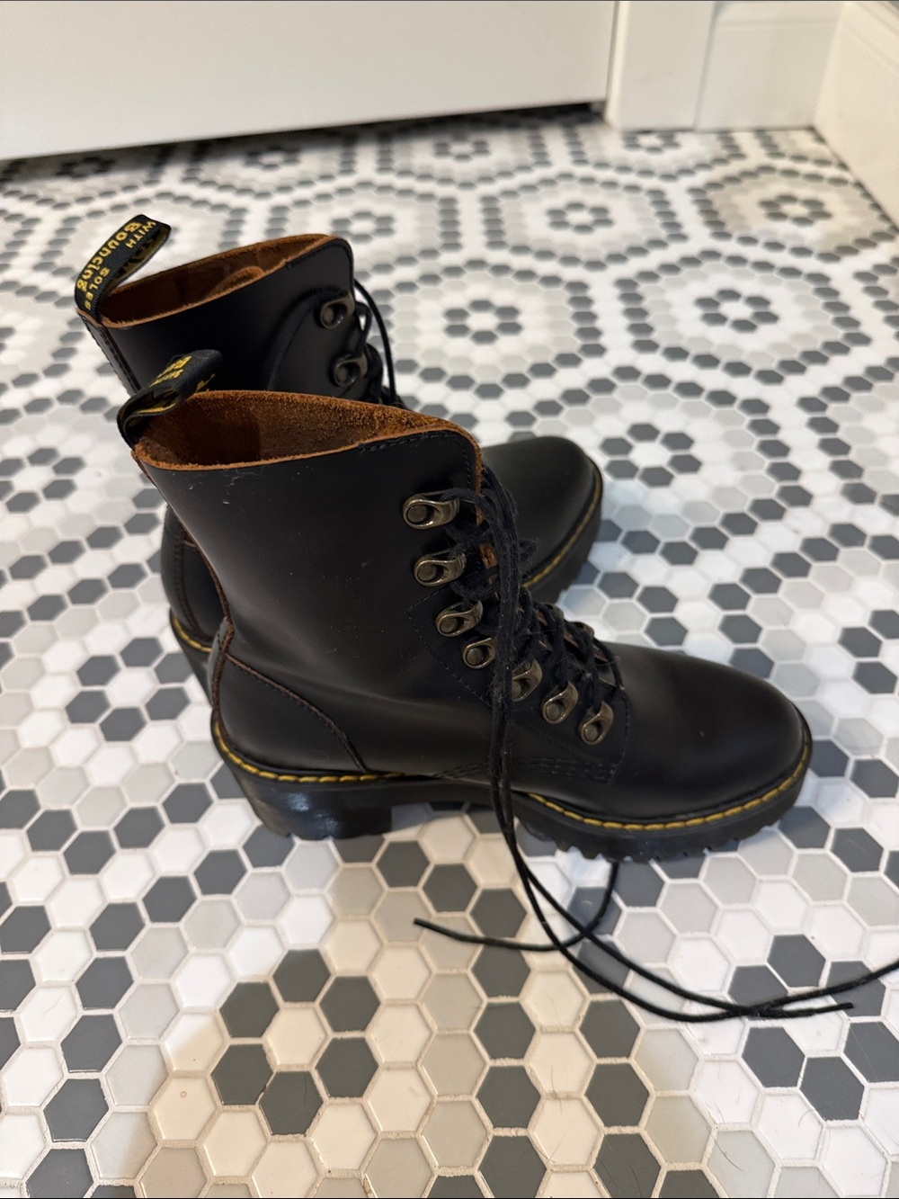 Dr. Martens Black Leather 8‑Eye Lace-Up Boots with Yellow Stitching